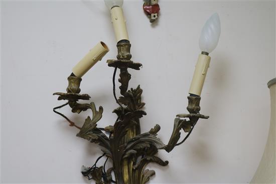 A pair of three branch ormolu wall lights length 55cm